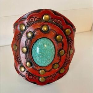 Leather snap cuff bracelet.